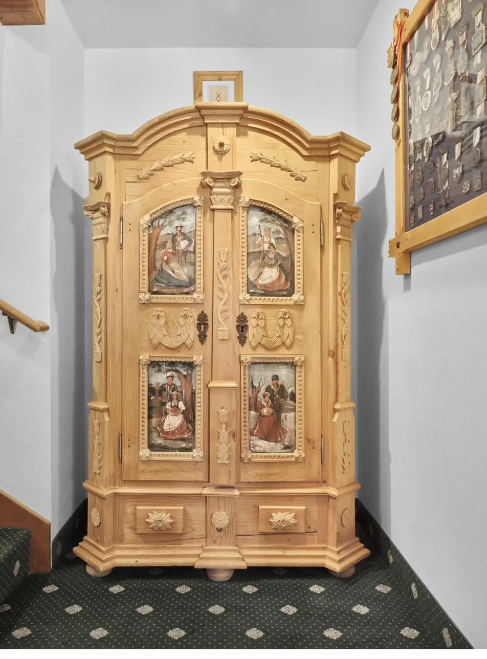 Four Seasons carved pine Schrank wardrobe, Bavarian Alpine furniture
