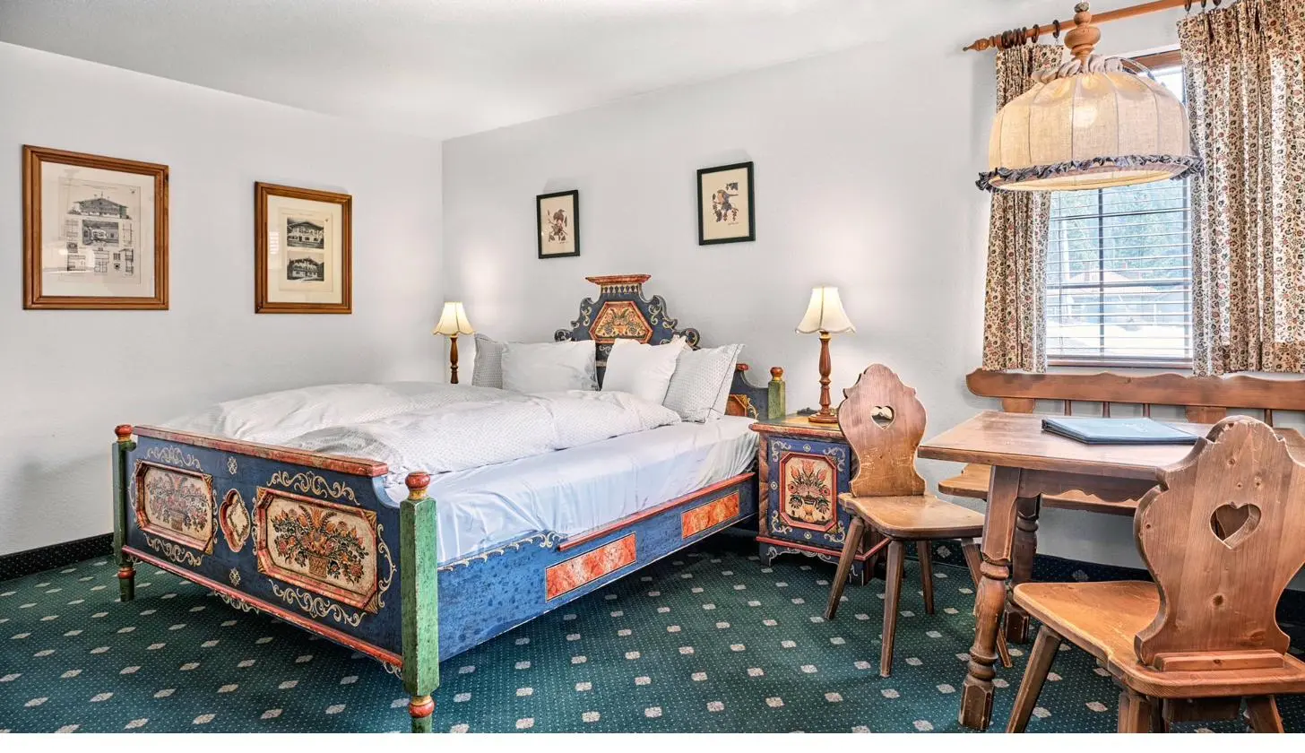 Zillertal painted bed frame with Herzlstühle, Bavarian Alpine furniture