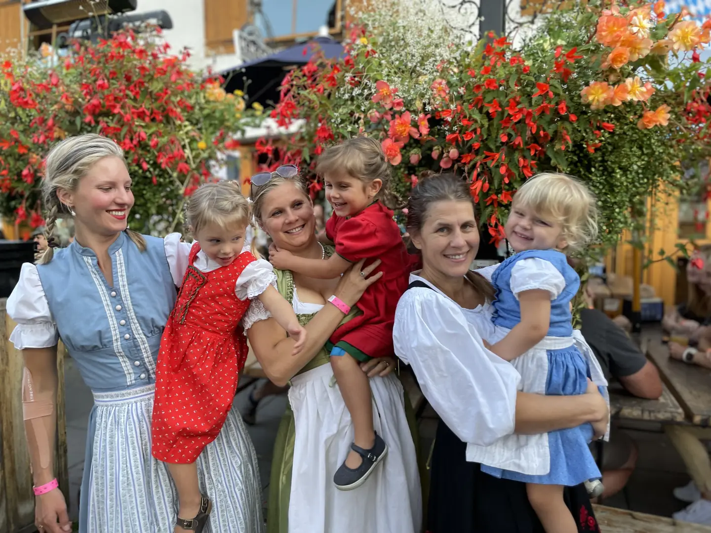 Families in traditional Bavarian dirndl at Leavenworth Oktoberfest