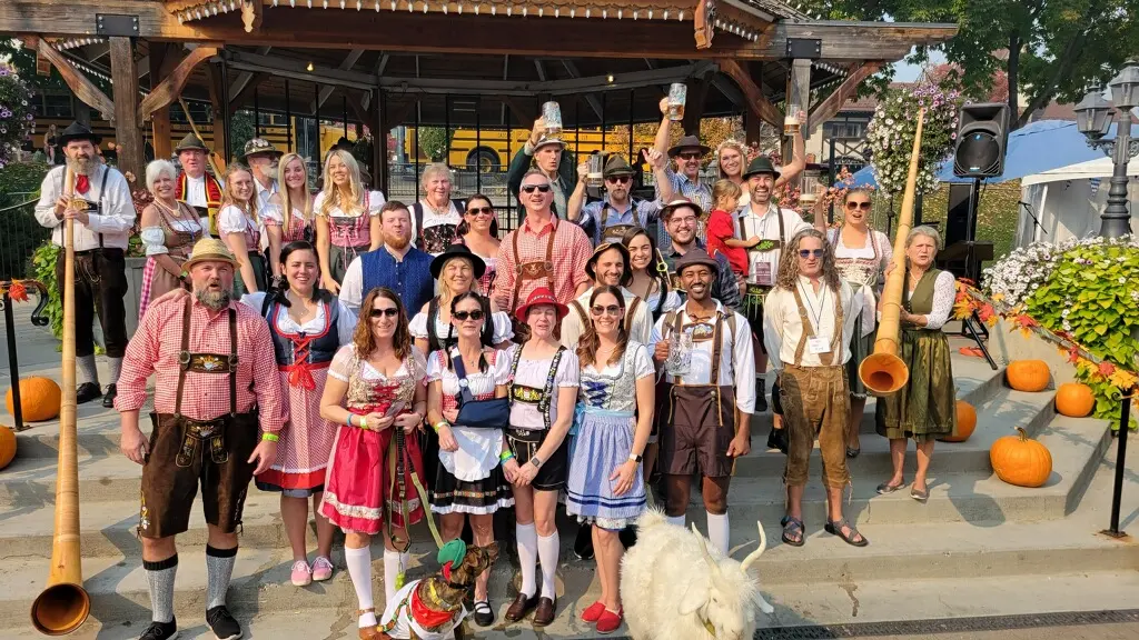 Group in traditional Bavarian dress at Leavenworth Oktoberfest gazebo
