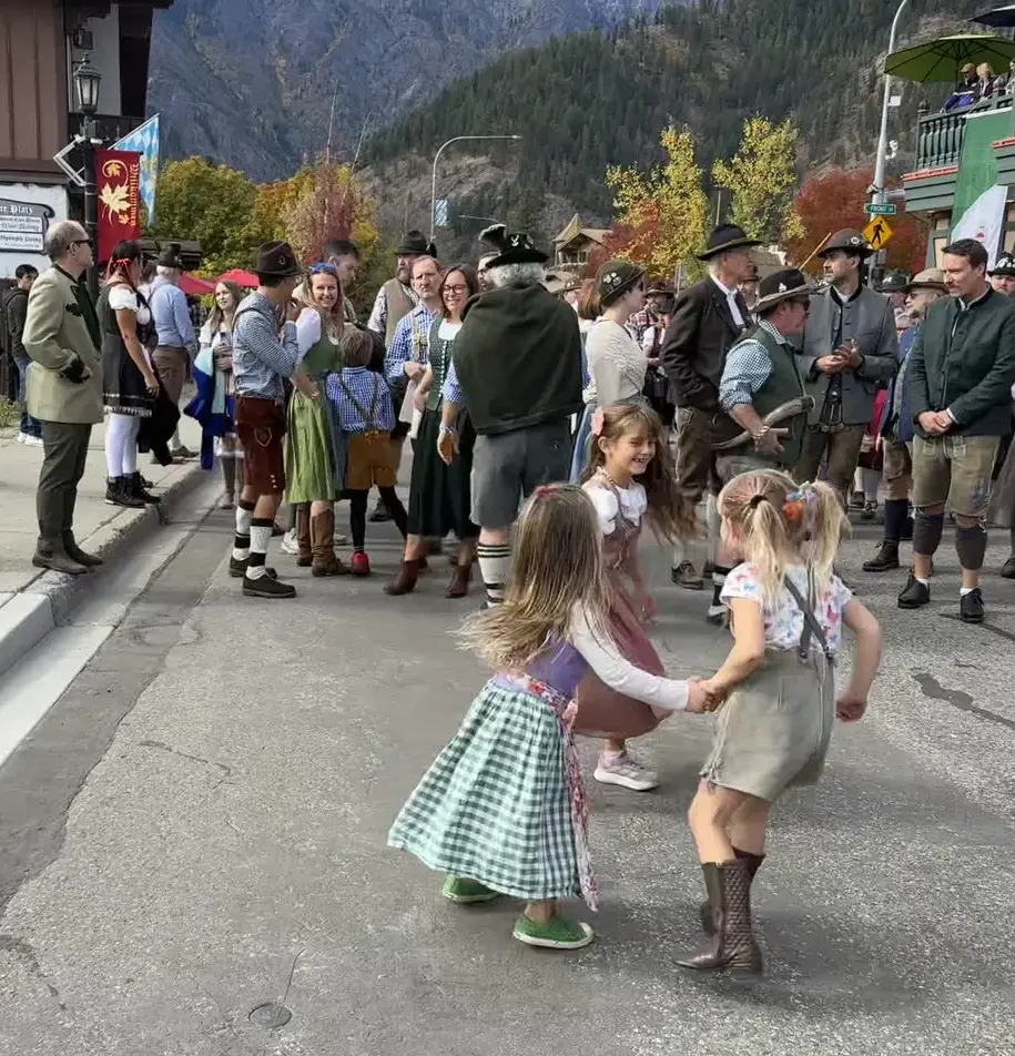 Children dancing in the street at Leavenworth Oktoberfest