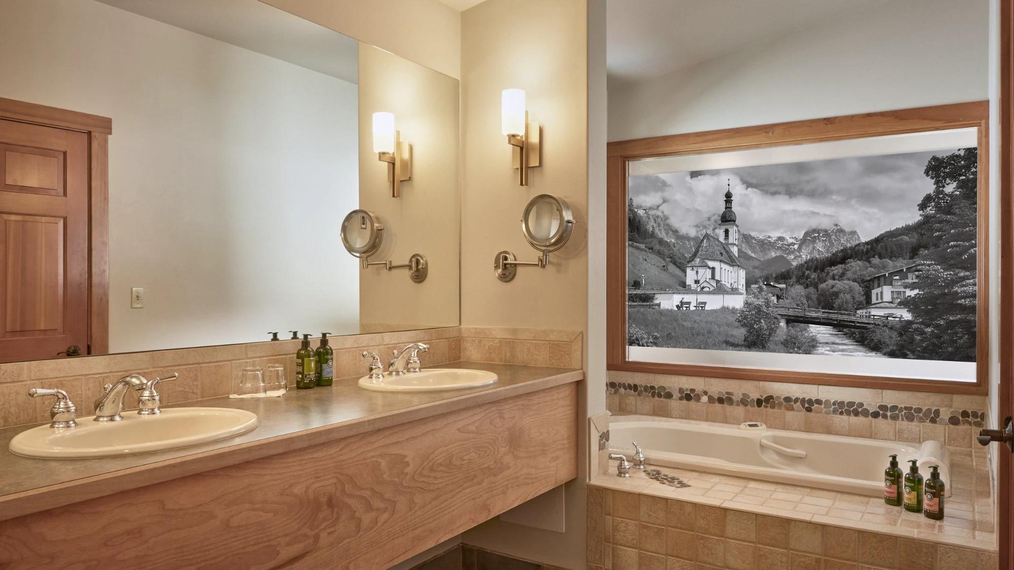 Summer Suite bathroom with double vanity and soaking tub