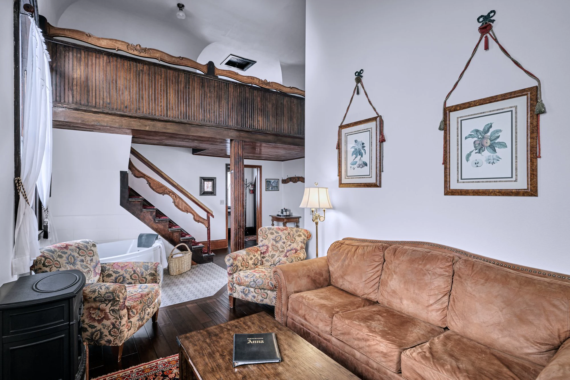Alte Kapelle Suite living area with mezzanine choir loft above